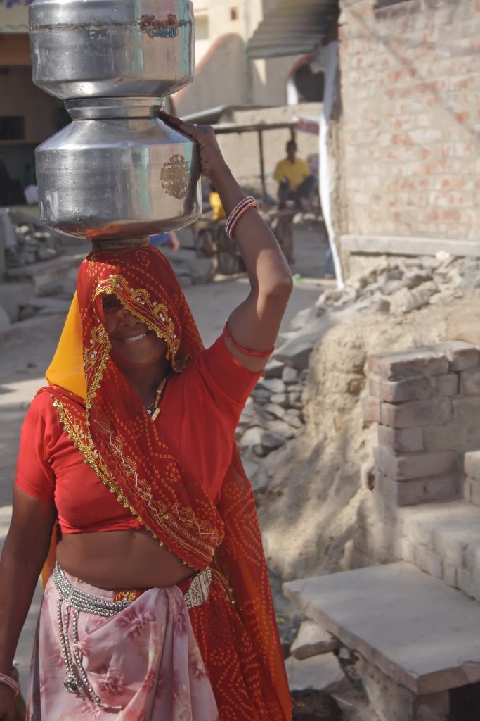 04-Woman with water buckets.jpg - Woman with water buckets